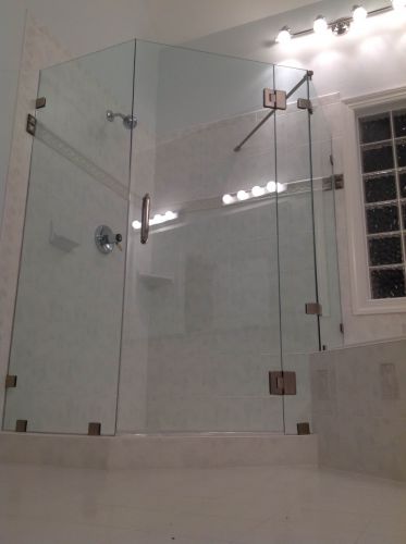 frameless-neo-angle-corner-shower-with-support-bar-installed-in-cary-nc-by-mia-shower-doors